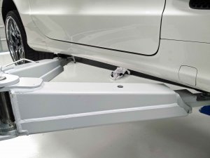 Arms of the Rav lift will fit nicely under the rocker panels of this Mercedes